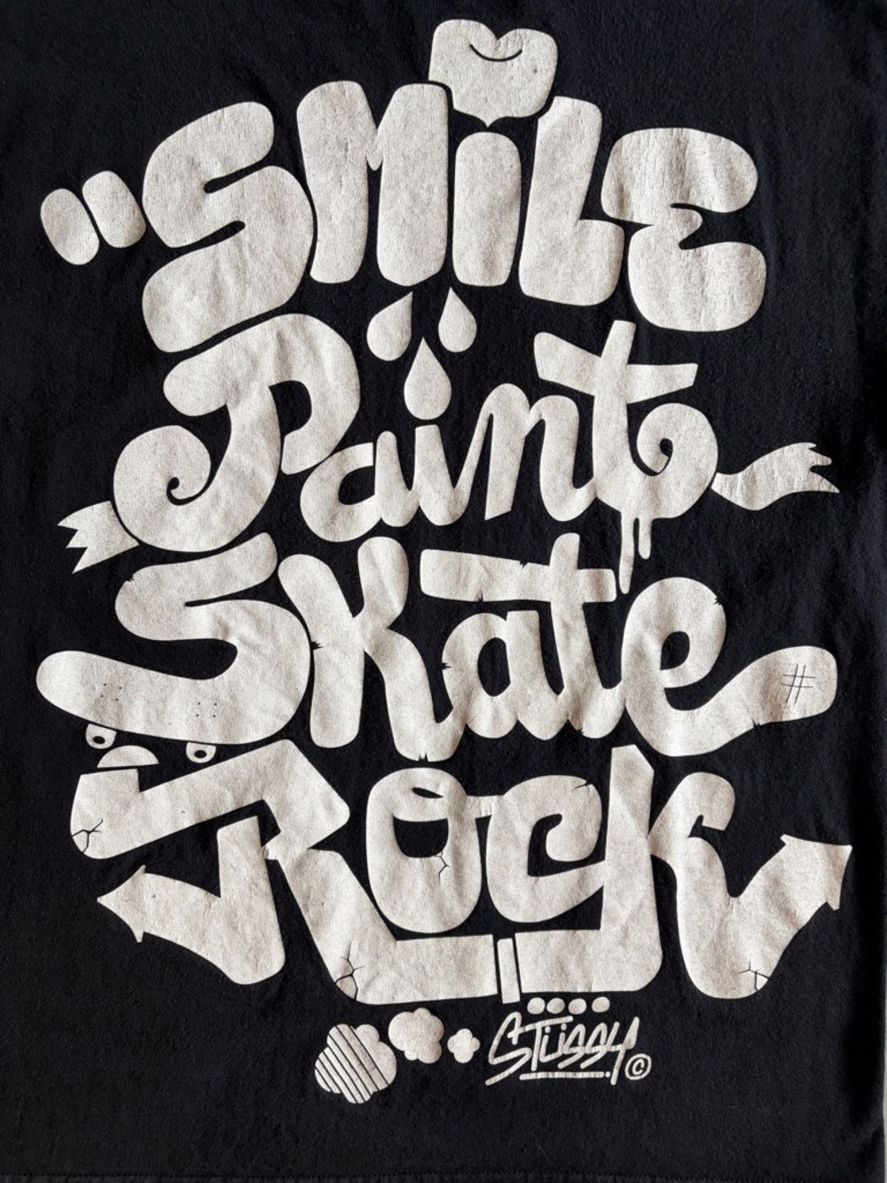 Stussy "Smile Paint Skate Rock" T-shirt

Size Medium
